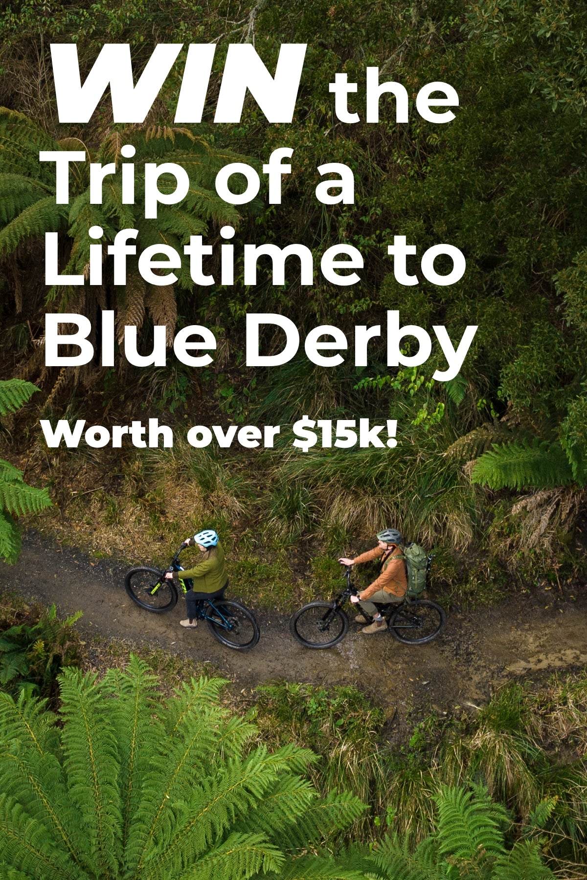 Two people cycling on a trail with text promoting a trip to Blue Derby.