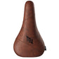 A brown bicycle saddle with 'TITLE' branding on the side.